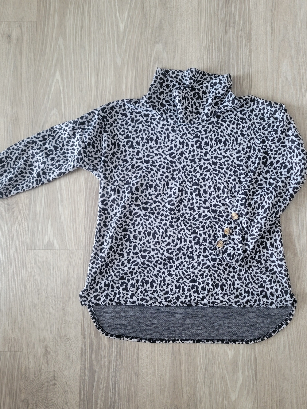 Soft Feminine Black & White Leopard Print Turtleneck Top with Button Detail